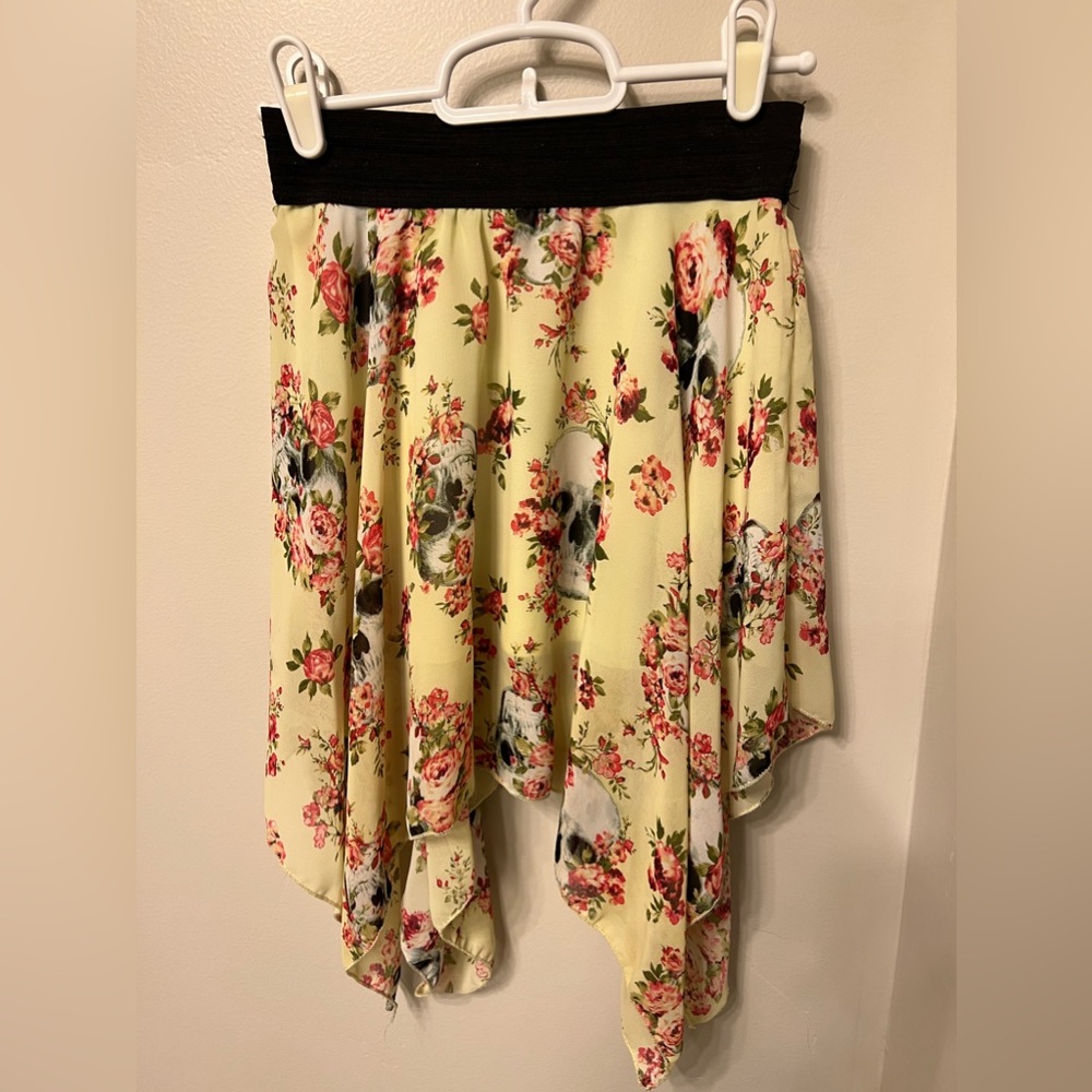 Yellow skirt with skull and flower design